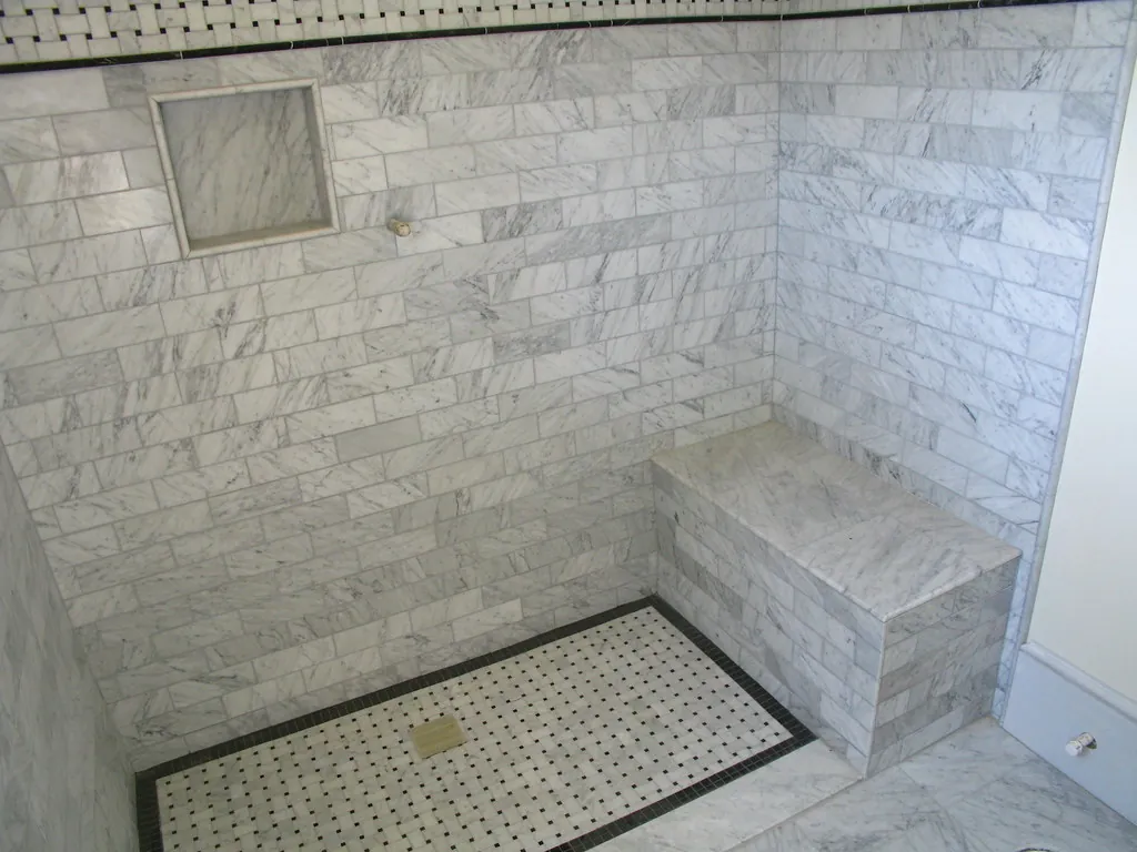 Bathroom tile and grout with water damage risk